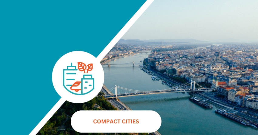 Zdjęcie dużego miasta z lotu ptaka, miasto przecina szeroka rzeka nad którą widać dwa mosty.